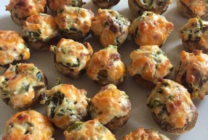 Thumbnail for Easy, Cheesy, and Savory Crab Stuffed Mushrooms You’ll Crave
