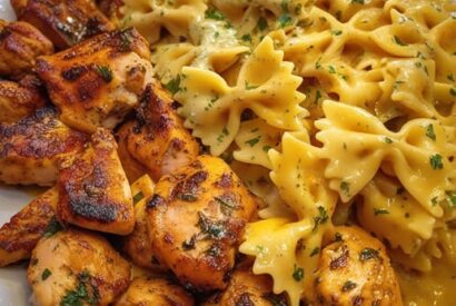 Thumbnail for Cajun Chicken Bowtie Pasta in Velveeta Garlic Butter Sauce
