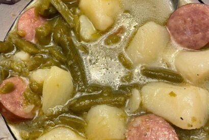 Thumbnail for Green beans and potatoes with polish sausage cooked with chicken broth